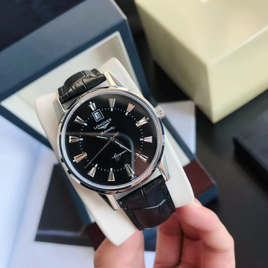 CONQUEST STEEL CASE BLACK DIAL GOLD NUMERALS