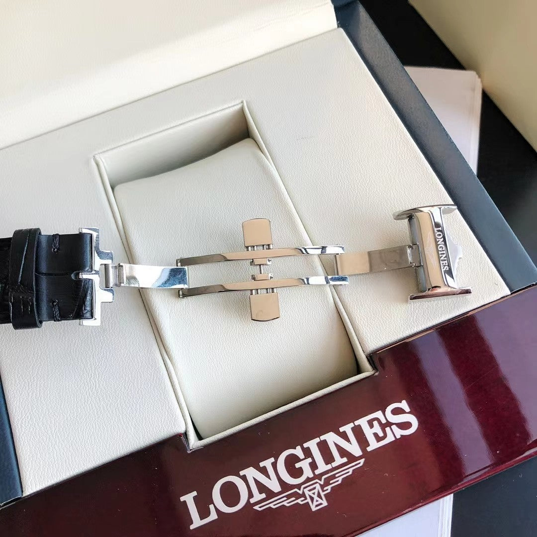 CONQUEST STEEL CASE BLACK DIAL GOLD NUMERALS