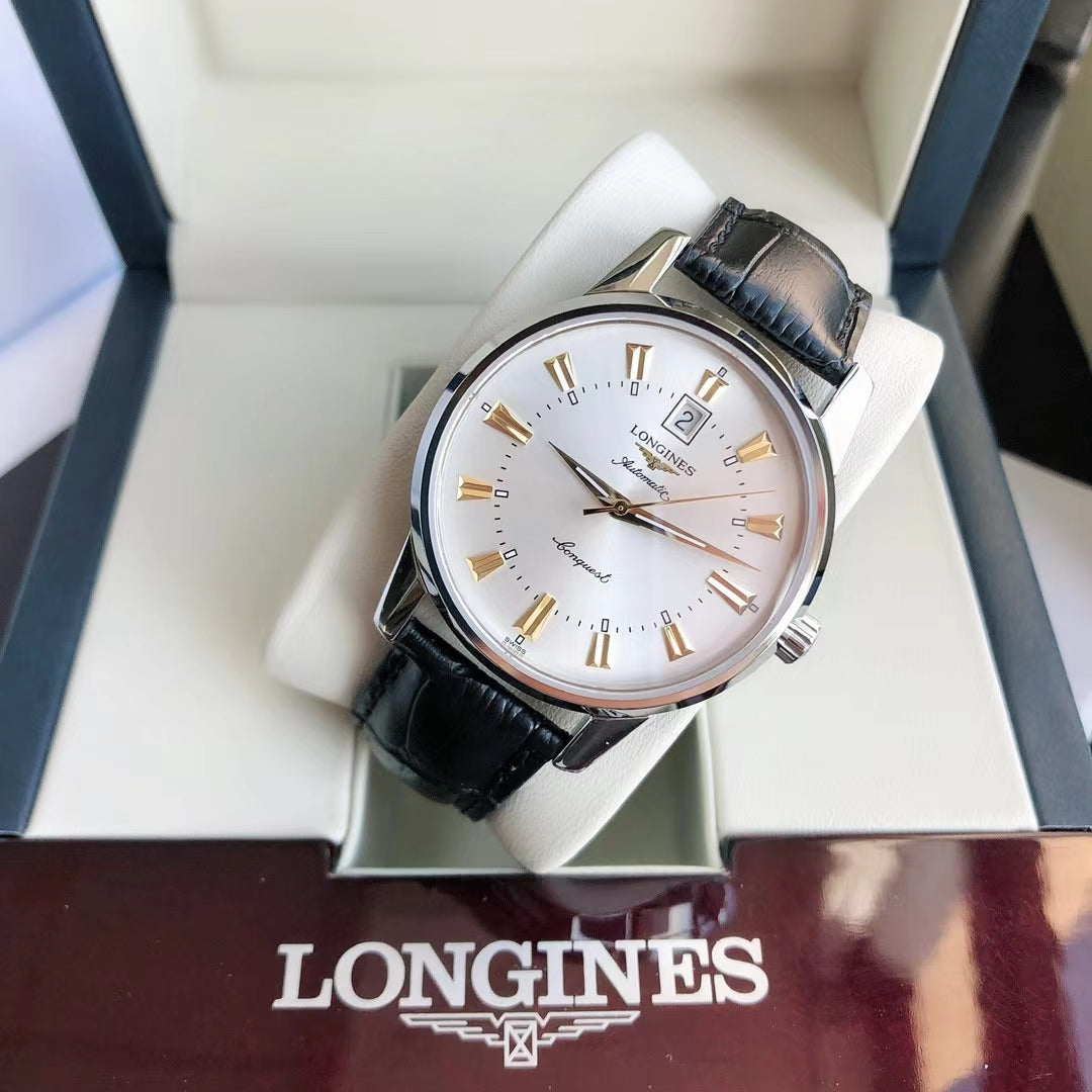 CONQUEST STEEL CASE WHITE DIAL GOLD NUMERAL