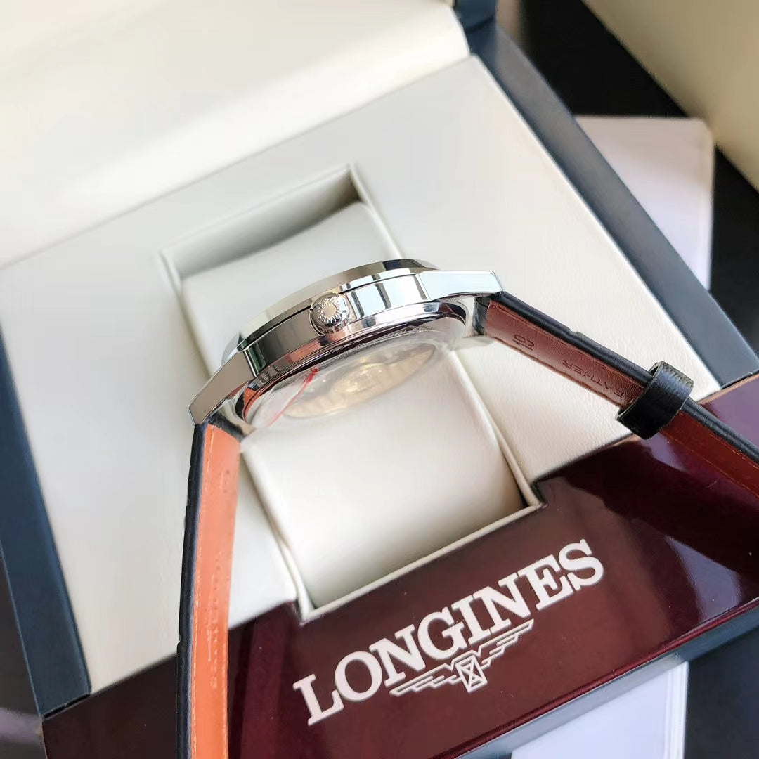 CONQUEST STEEL CASE WHITE DIAL GOLD NUMERAL