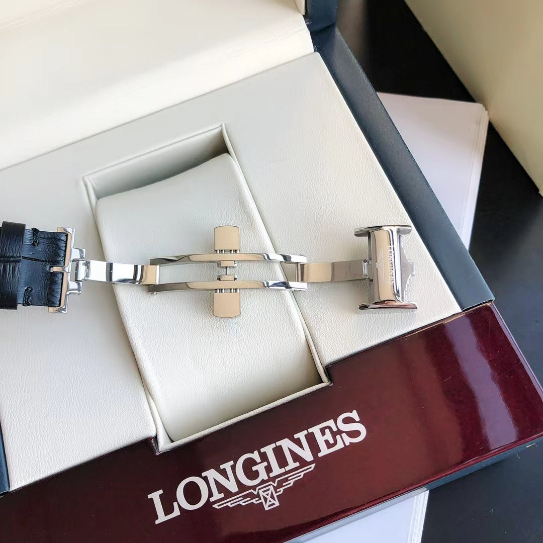 CONQUEST STEEL CASE WHITE DIAL GOLD NUMERAL