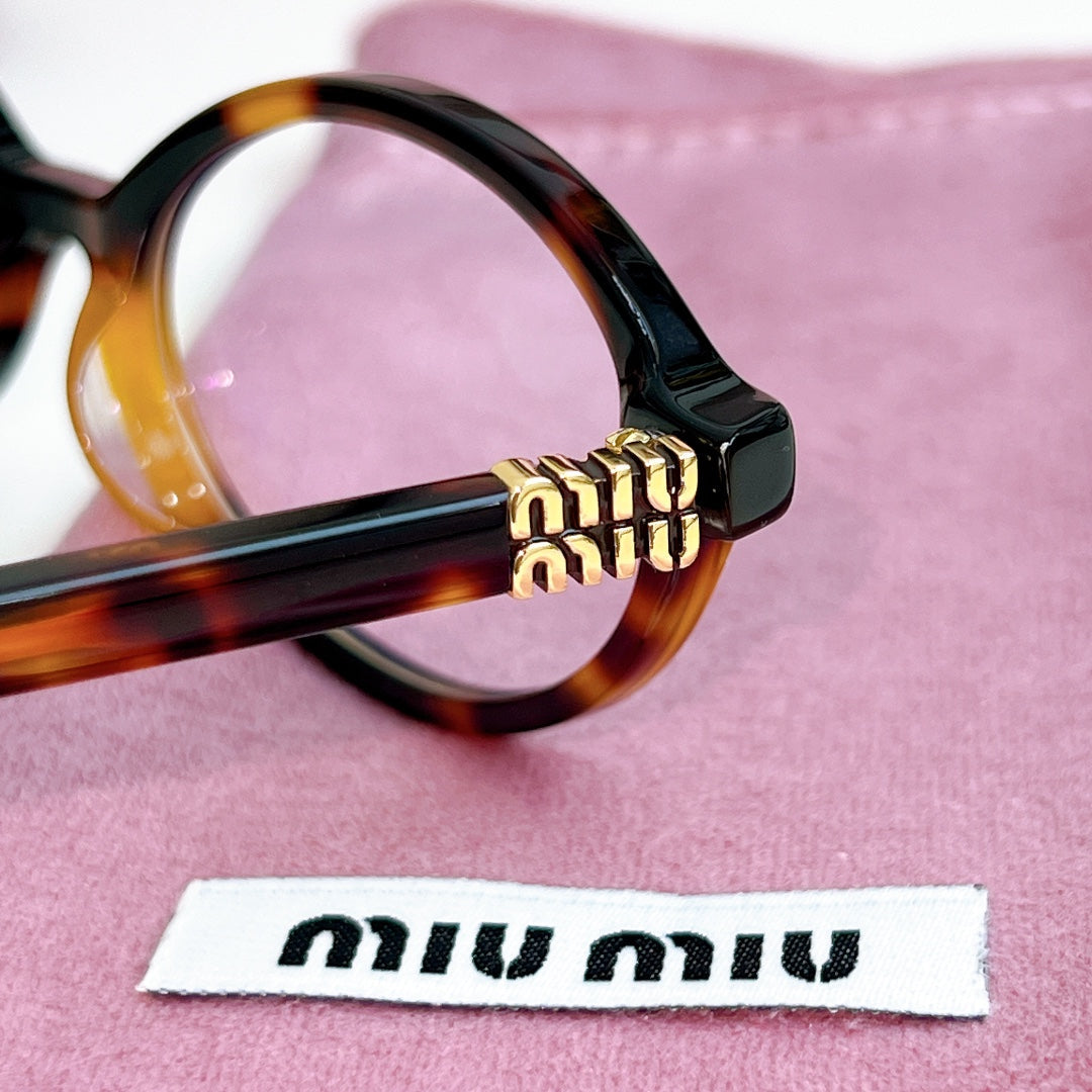 Miumiu Sunglasses SMU04Z