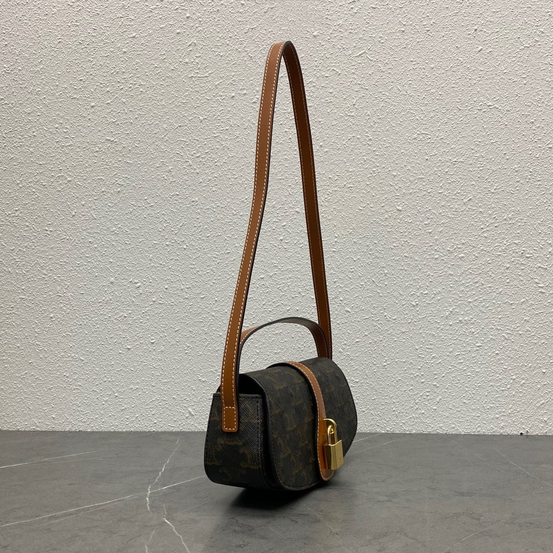 Celine 2026 Tabou Clutch on Strap Triomphe Canvas Calfskin 281765