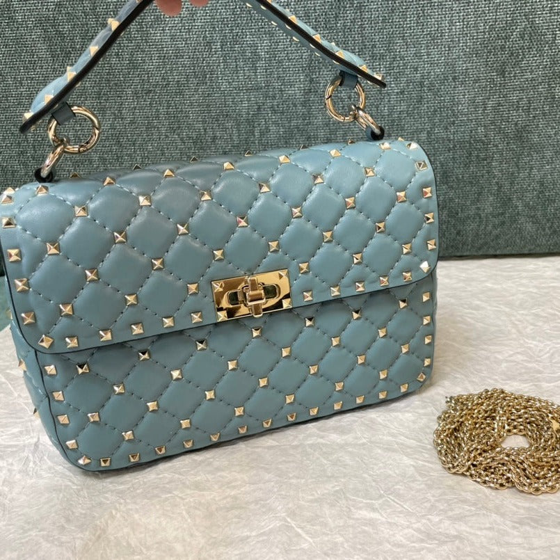 garavani rockstud spike medium 24cm azure lambskin
