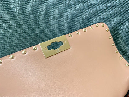 garavani rockstud spike medium 24cm beige lambskin