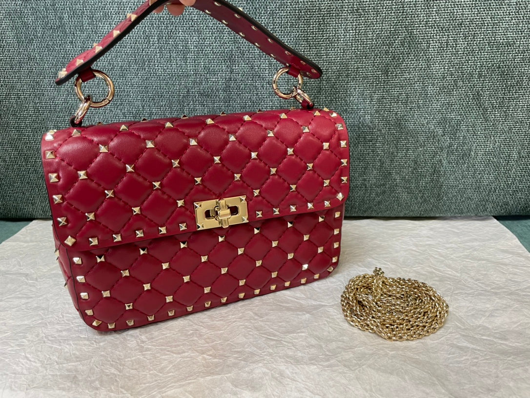 garavani rockstud spike medium 24cm red lambskin
