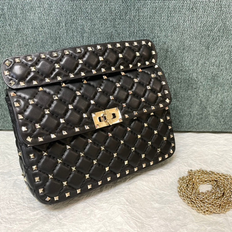 garavani rockstud spike medium 24cm black lambskin gold hardware