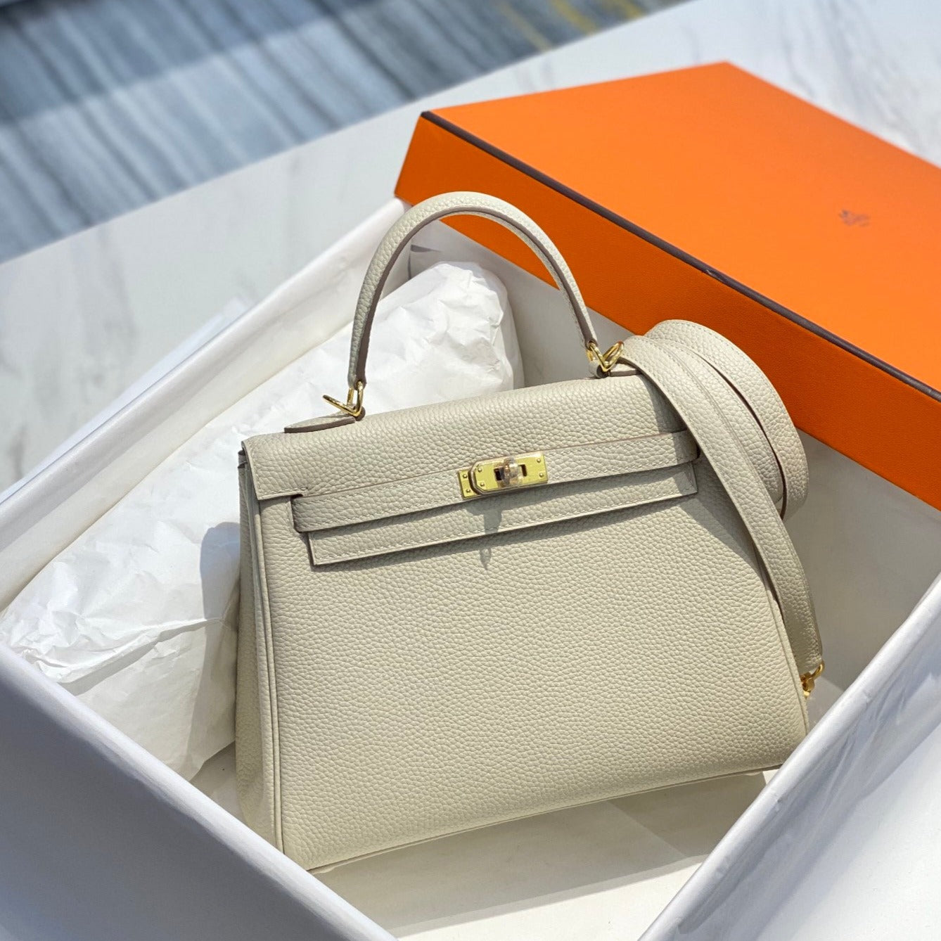 hm kelly 32cm togo leather gold hardware