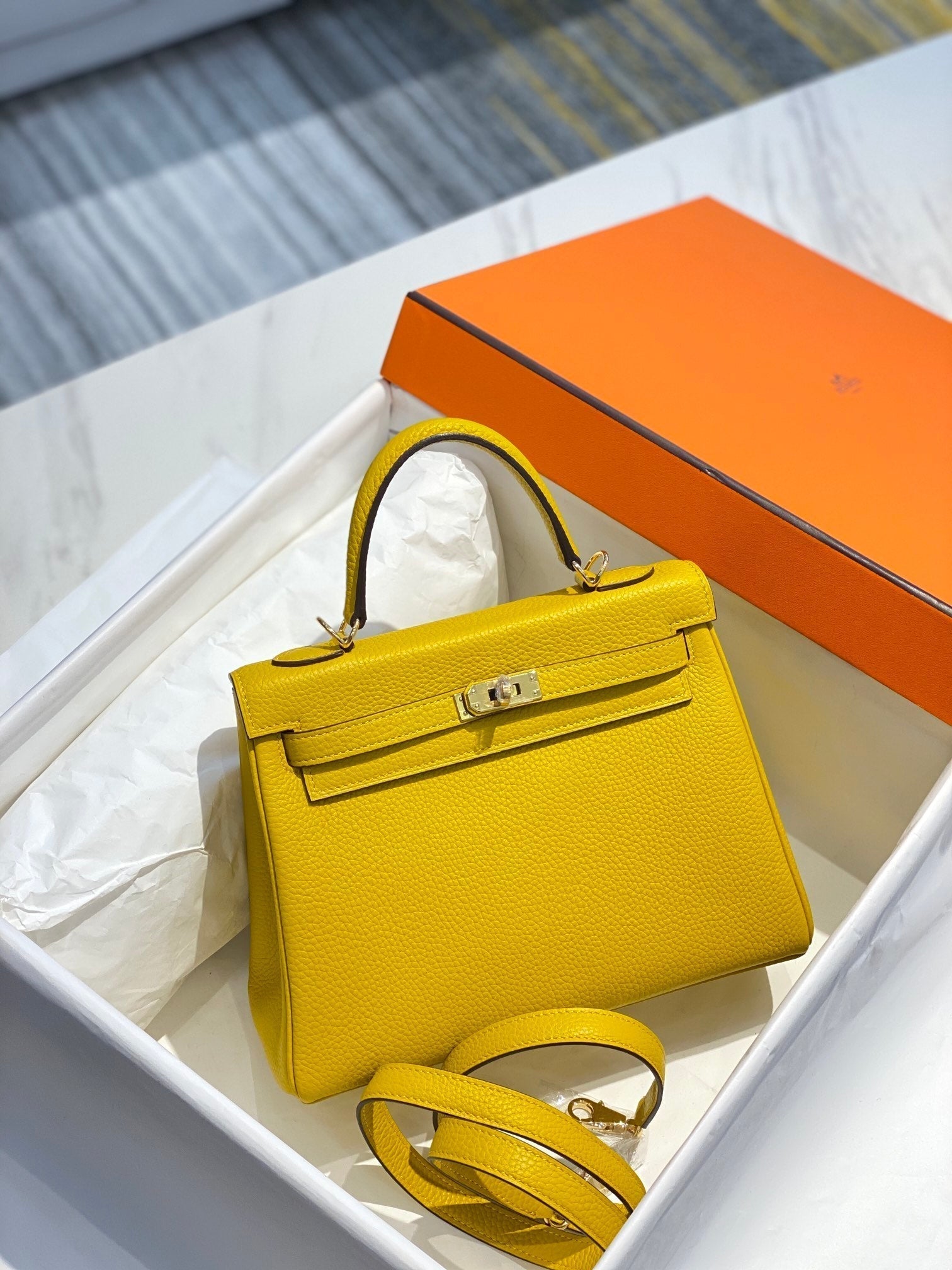 HM KELLY 25CM YELLOW TOGO GOLD HARDWARE