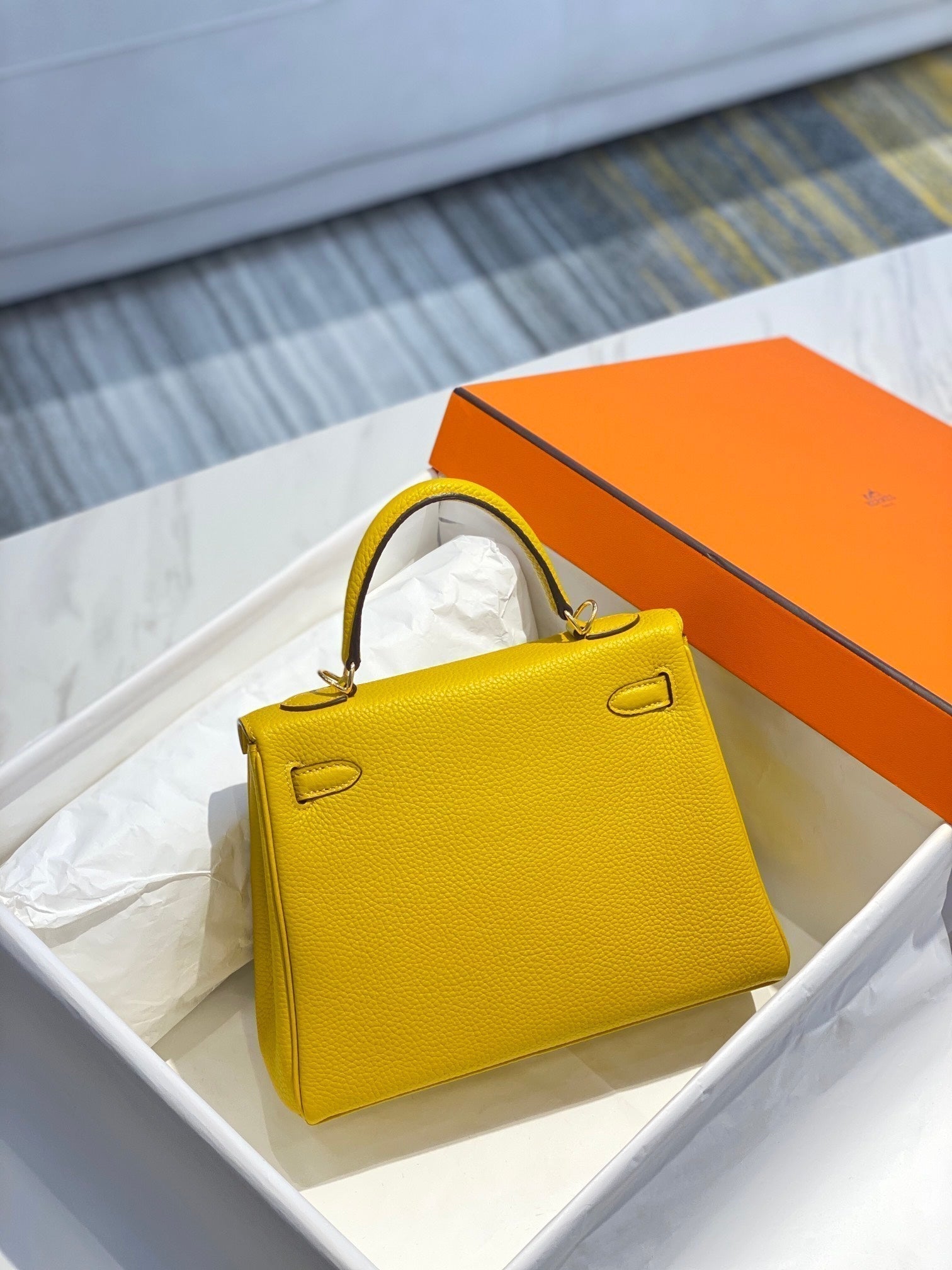HM KELLY 32CM BAG IN LEMON TOGO GOLD HARDWARE