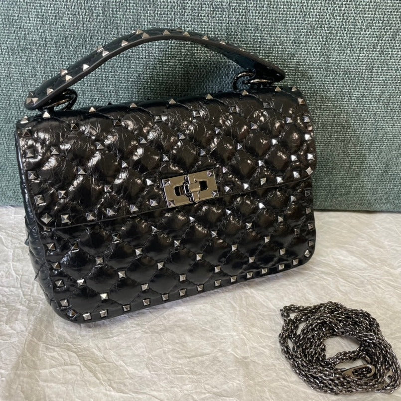 garavani rockstud spike medium 24cm black lambskin