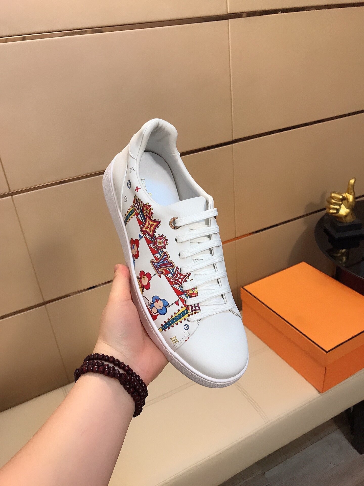 LV TRAINER WHITE CALFSKIN WITH COLORFUL PATTERN