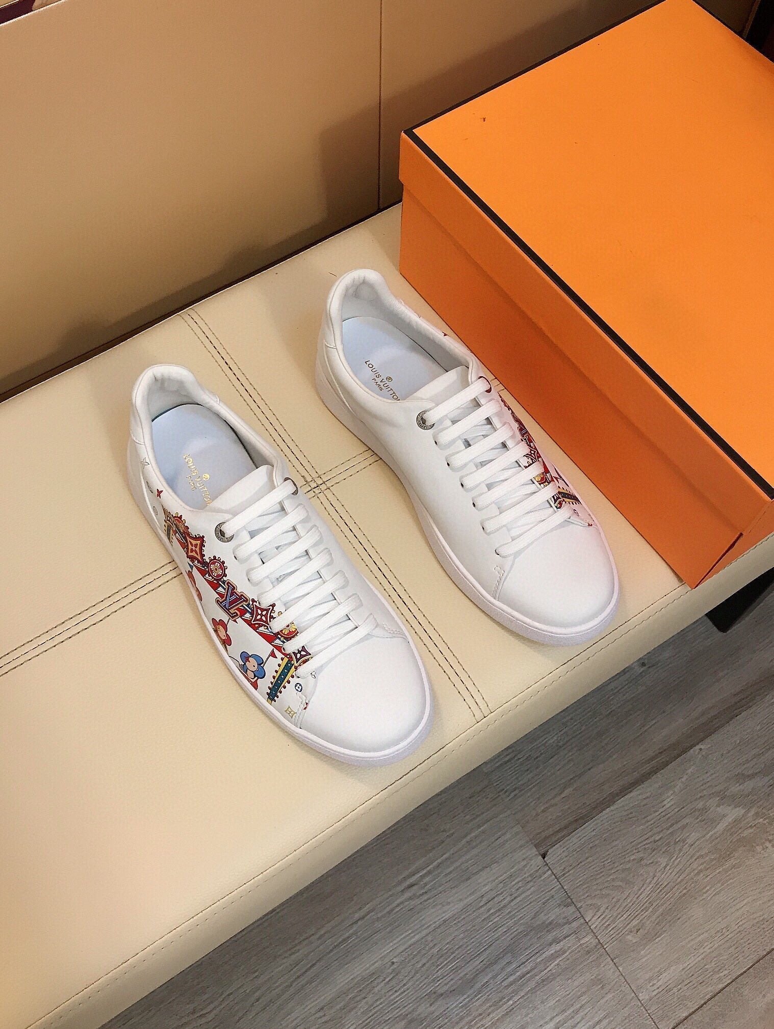 LV TRAINER WHITE CALFSKIN WITH COLORFUL PATTERN