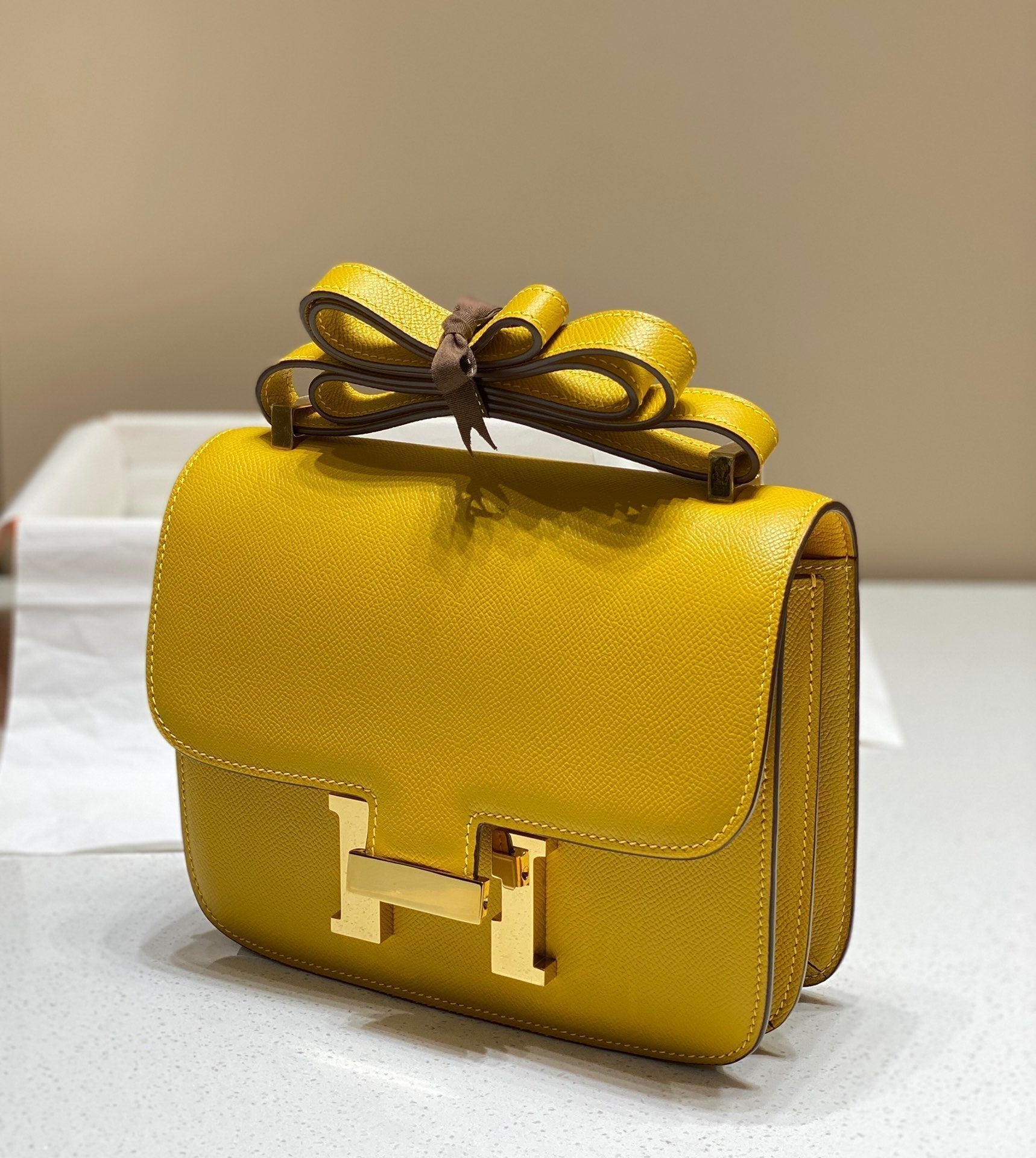 constance 24 yellow epsom leather gold hardware