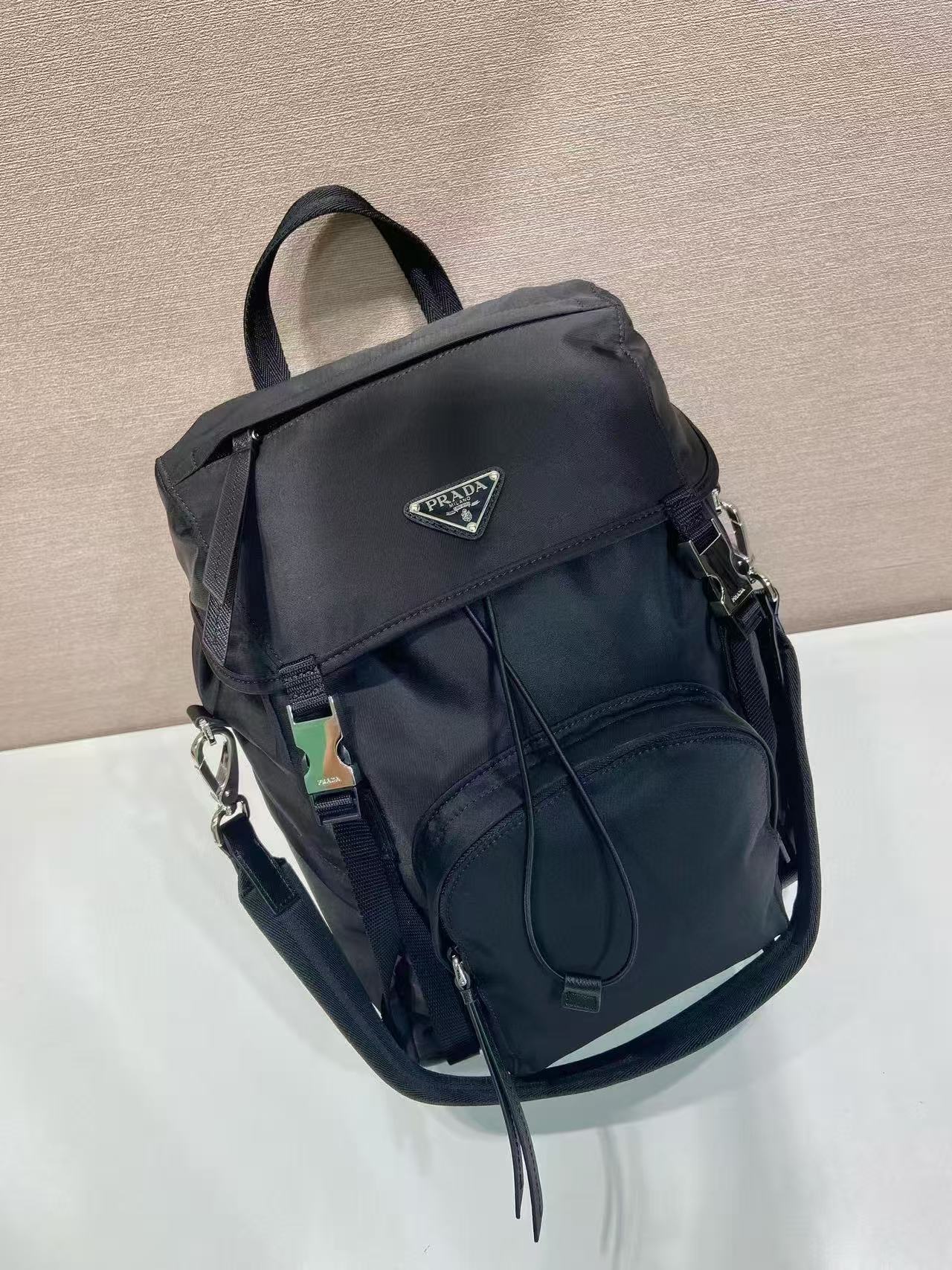 BACKPACK 34.5 IN BLACK RE-NYLON AND SAFFIANO LEATHER TRIM