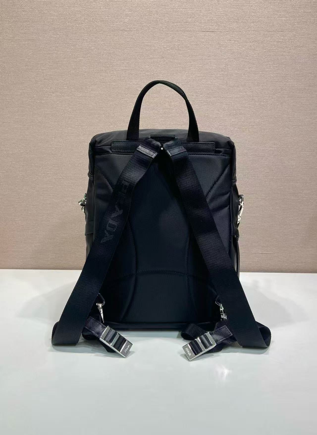 BACKPACK 34.5 IN BLACK RE-NYLON AND SAFFIANO LEATHER TRIM
