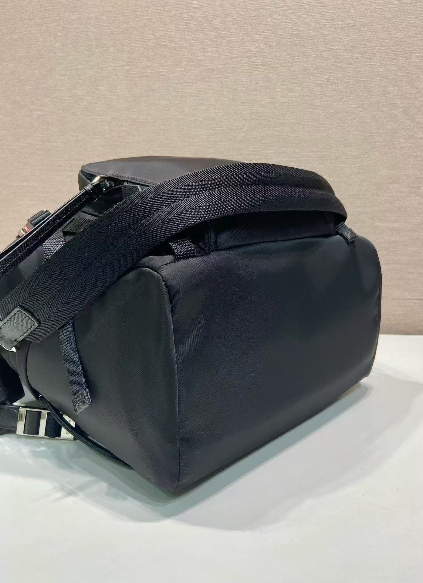 BACKPACK 34.5 IN BLACK RE-NYLON AND SAFFIANO LEATHER TRIM