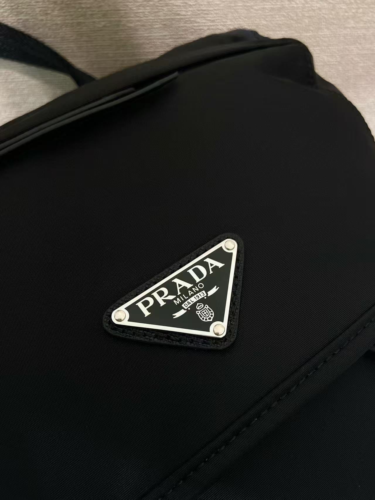 BACKPACK 34.5 IN BLACK RE-NYLON AND SAFFIANO LEATHER TRIM