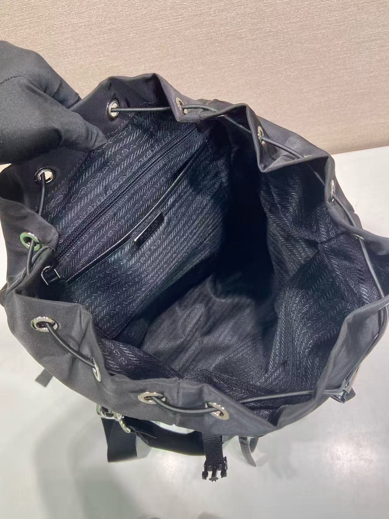 BACKPACK 34.5 IN BLACK RE-NYLON AND SAFFIANO LEATHER TRIM
