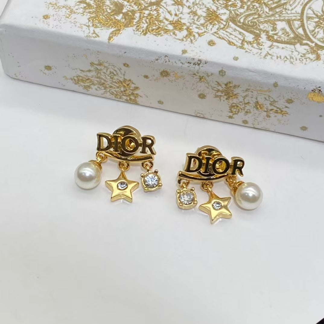 CD DioRevolution Earrings Gold-Finish Metal