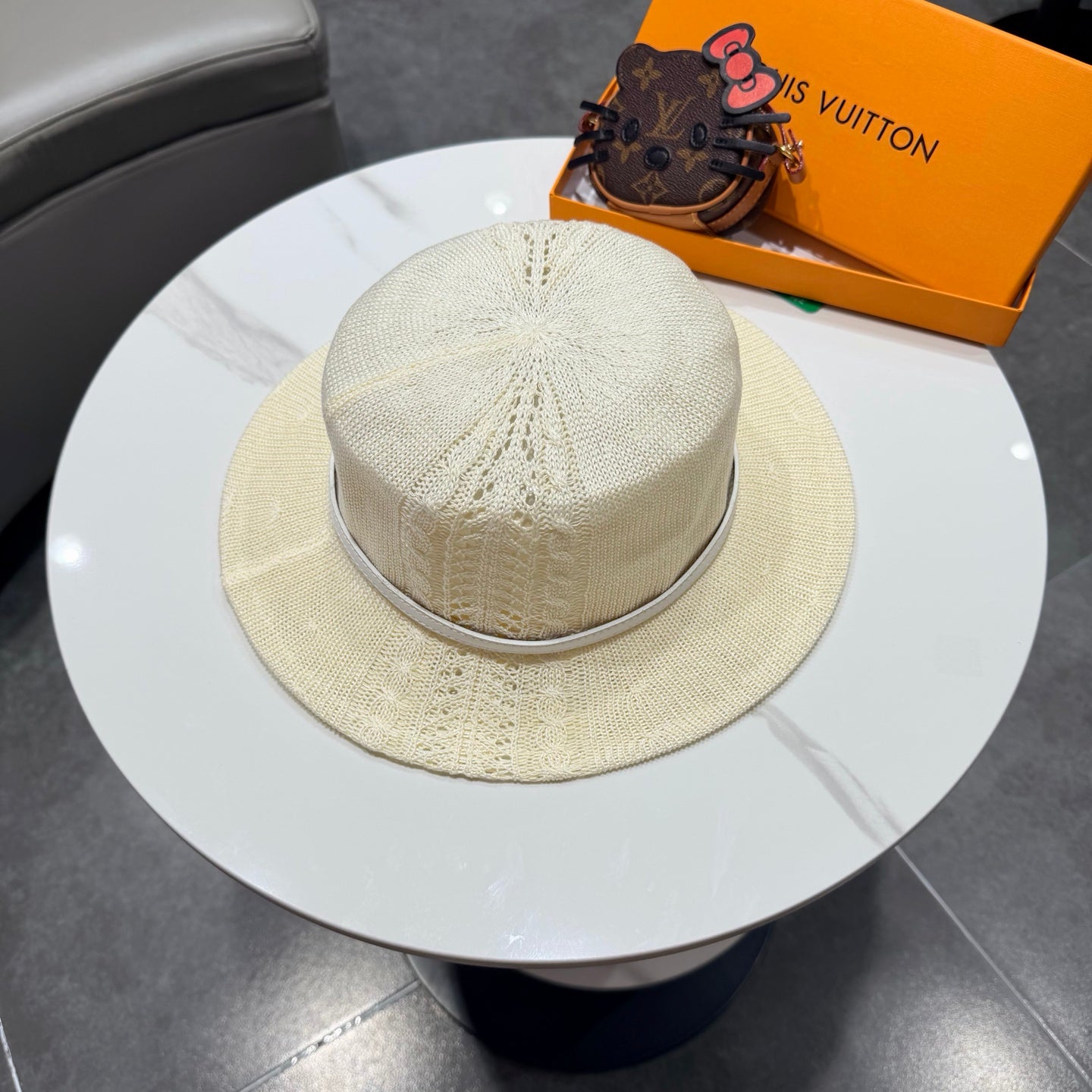 Louis Vuitton  Hollow-Out Flat Top Knit Hat 219132