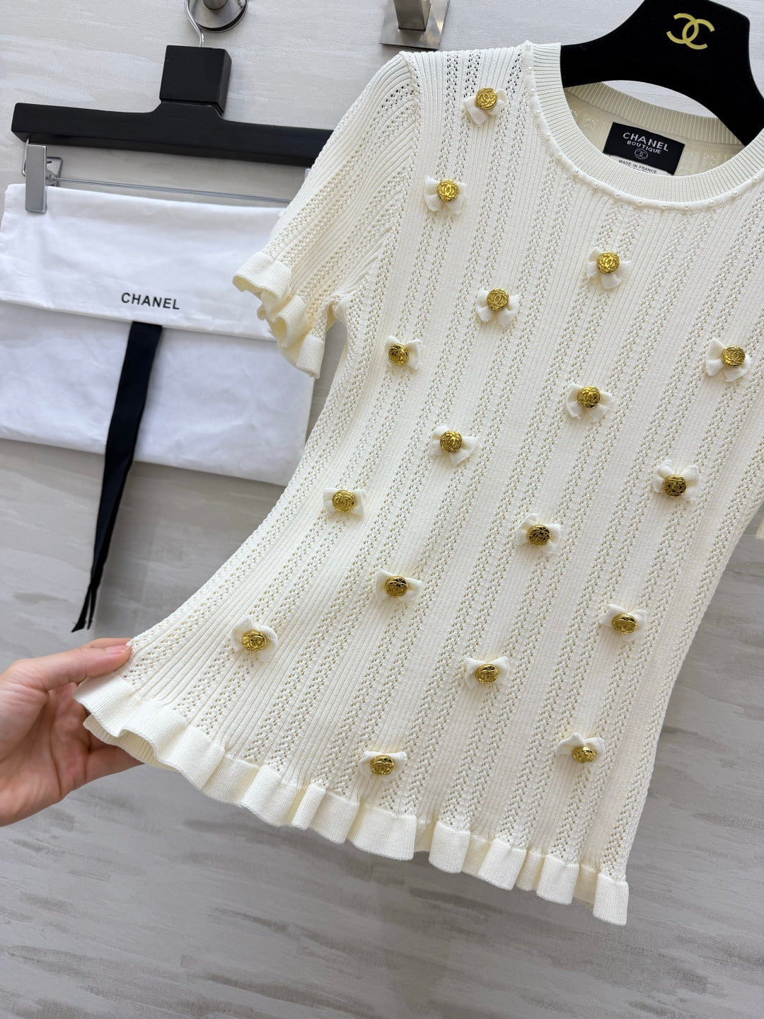 Chanel 2026 Gold Button Bow Short-sleeve Top Cream Cotton 394202