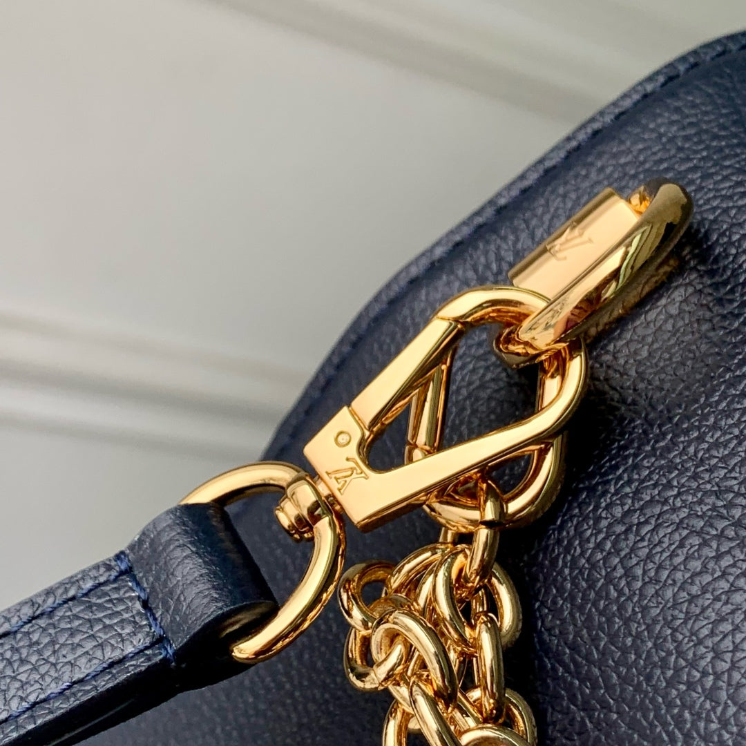 Twist MM Slim 23cm Dark Blue Calfskin 251410