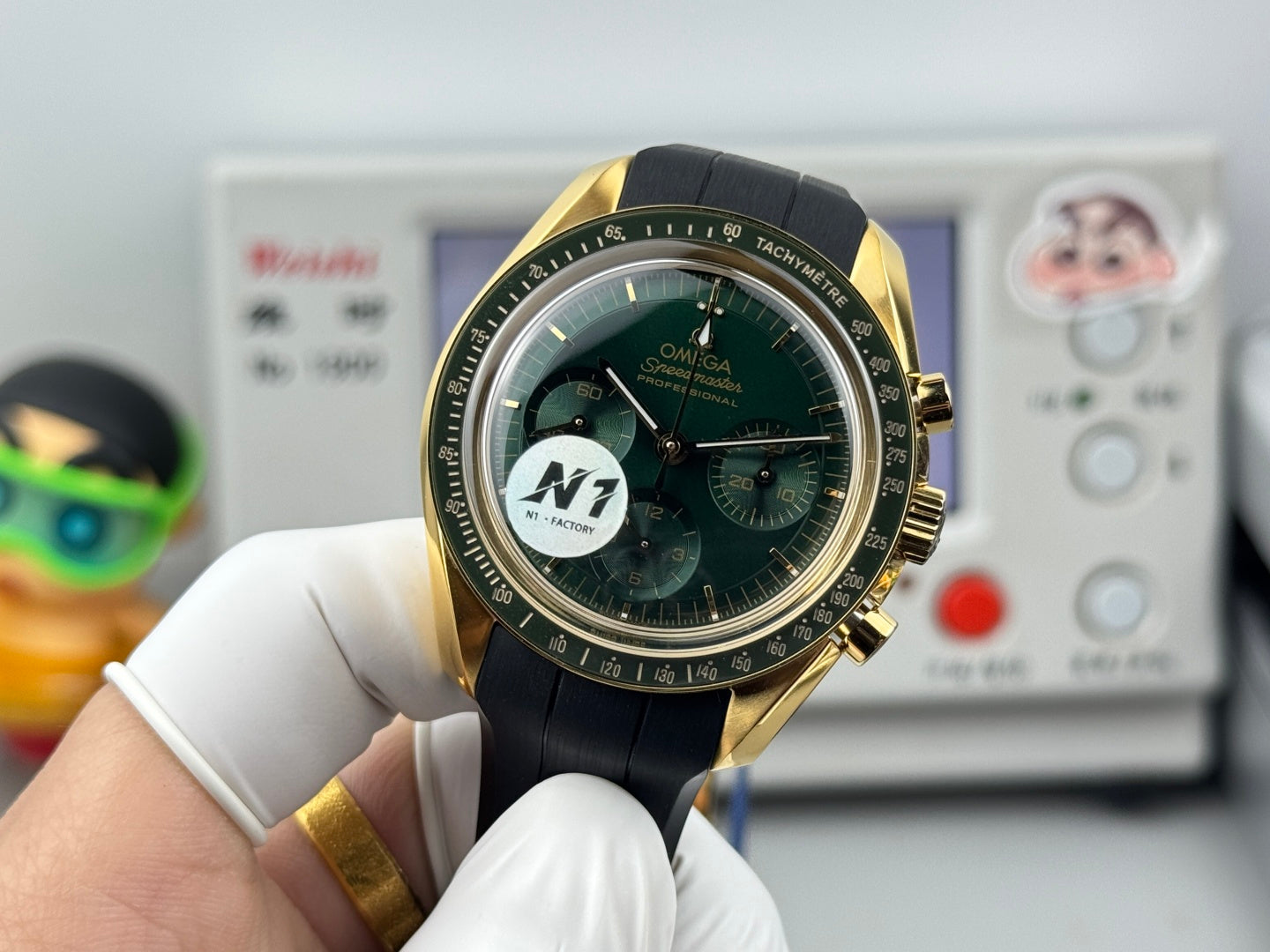 Omega Speedmaster Moonwatch Professional 42mm Green Dial Gold Case Rubber Strap