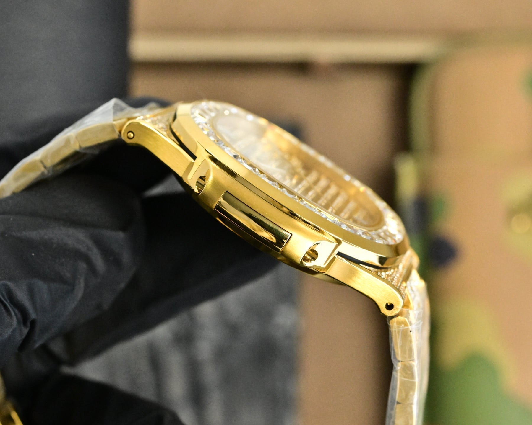 Patek Philippe Nautilus 40mm Yellow Gold Baguette Diamonds Watch