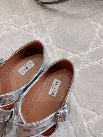 ALAIA CRISS CROSS BALLET FLAT IN SILVER LAMBSKIN