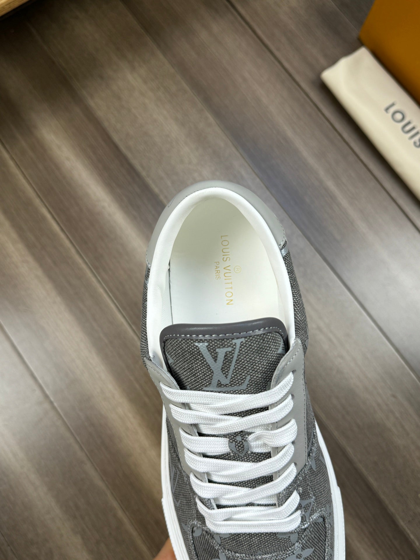 LV TRAINER SNEAKER IN GREY PASTEL MONOGRAM DENIM