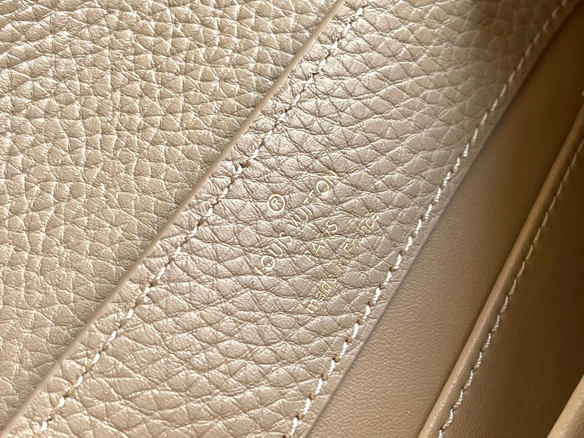 CAPUCINES MINI 21 DARK BEIGE TAURILLON GOLD HARDWARE