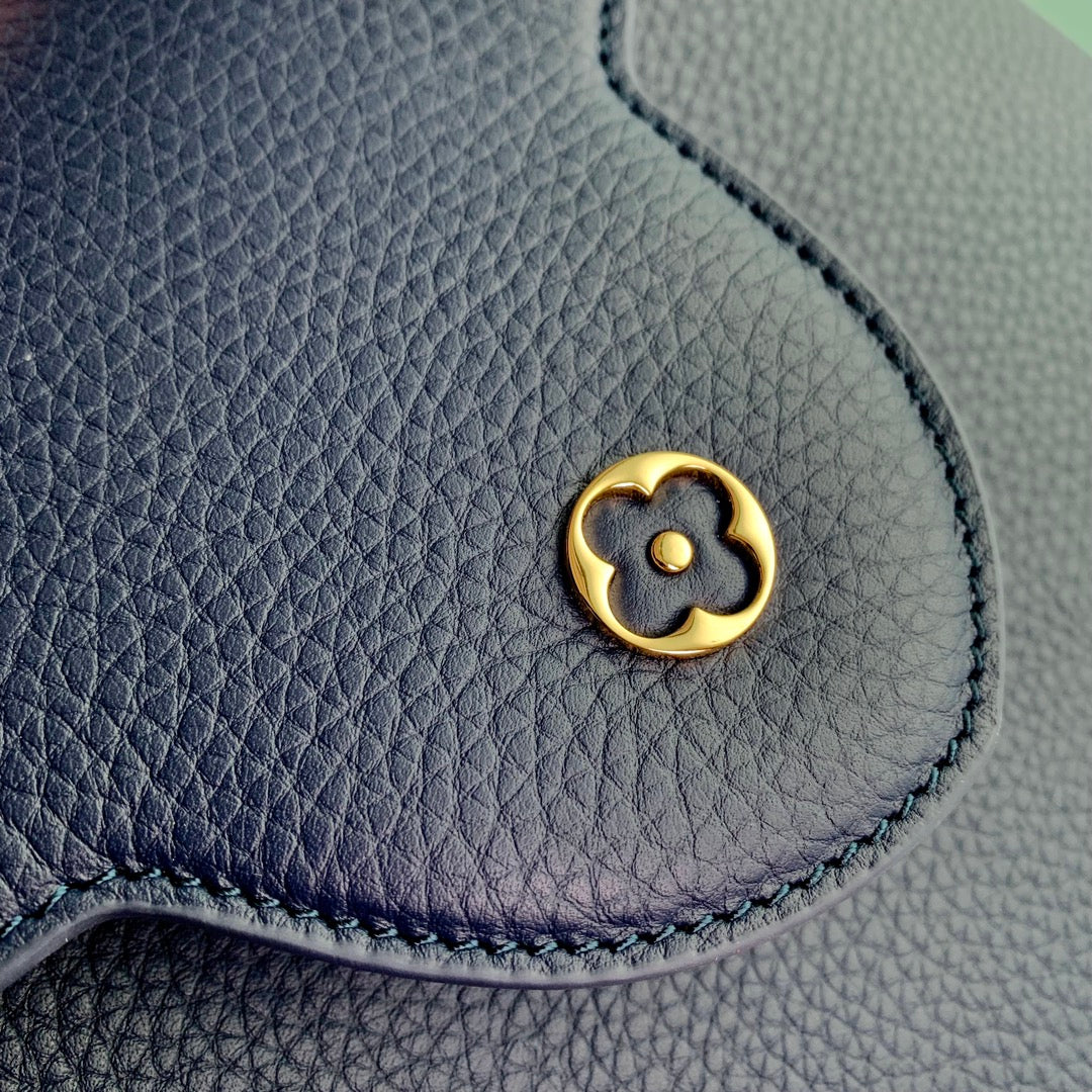 CAPUCINES MINI 21 DARK BLUE TAURILLON GOLD HARDWARE