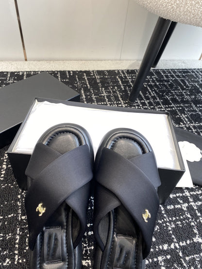 cross puffy slipper black lycra fabric