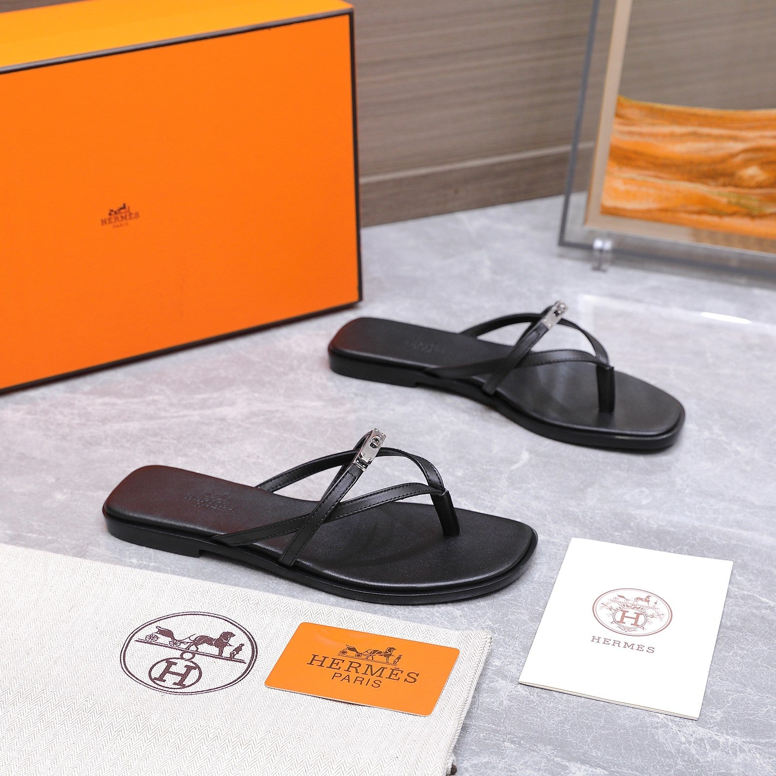 HM 26ss Kelly Sliver Buckle Slipper Black Calfskin 601247