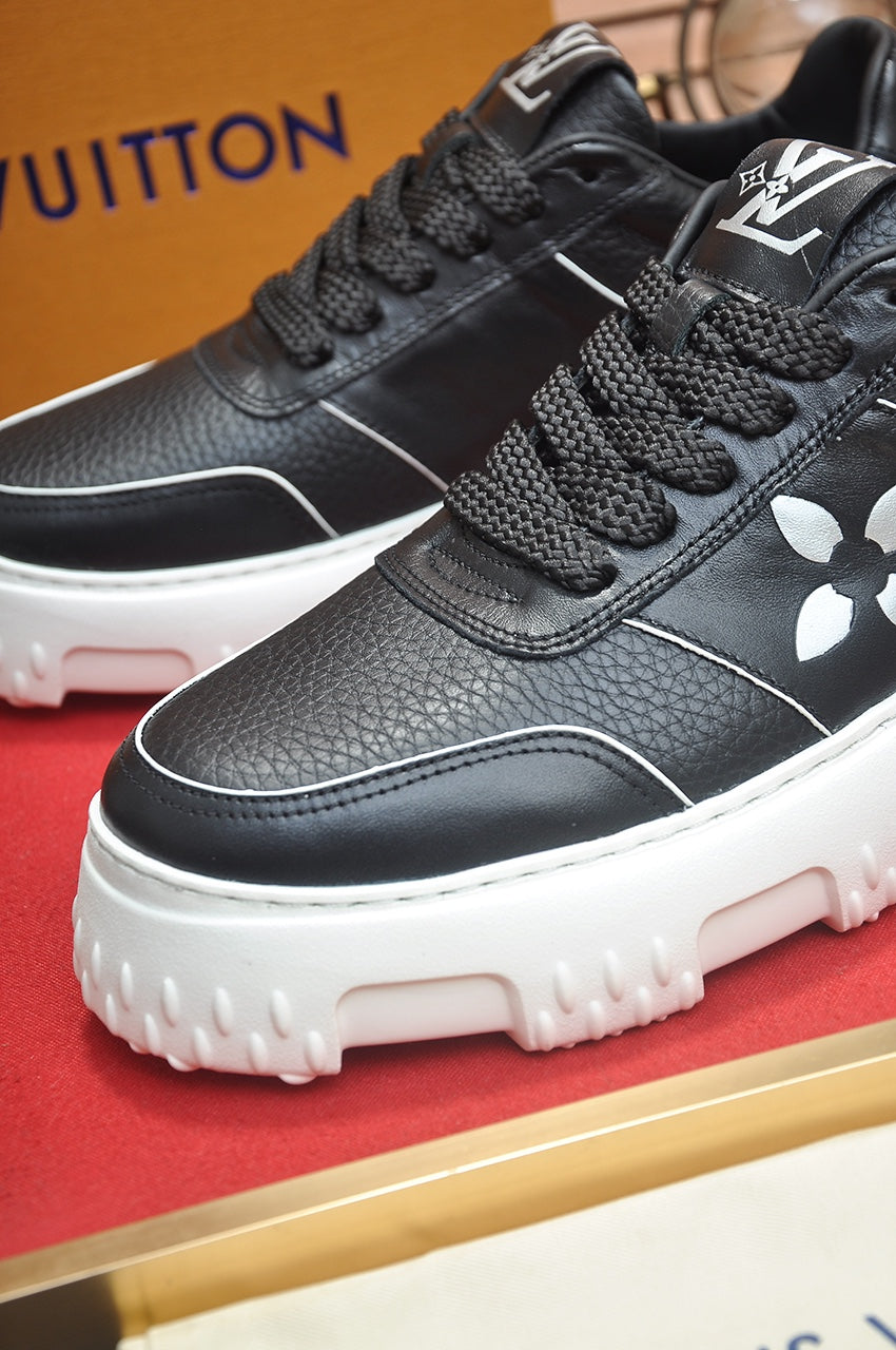 LV TRAINER BLACK MONOGRAM CALFSKIN