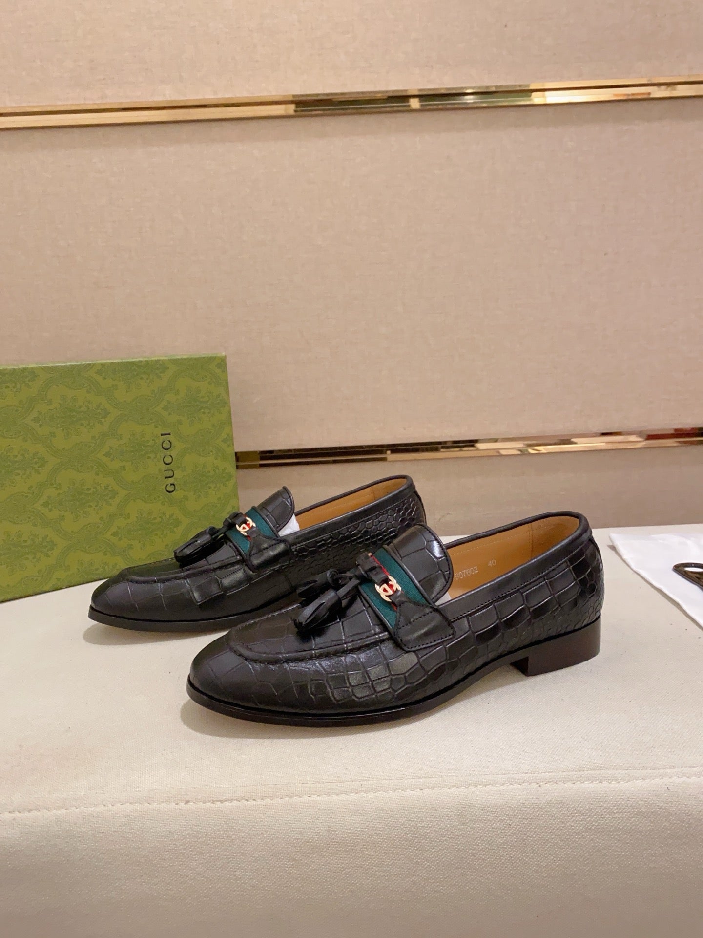 GG Men's Tassel Loafer Black Embossed Cowhide 573361