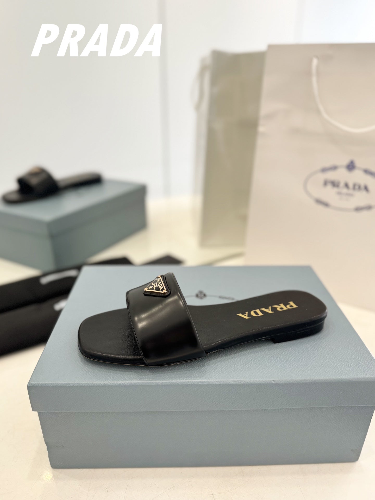 Prada 2026 Silde Sandal Black Cowhide 664761