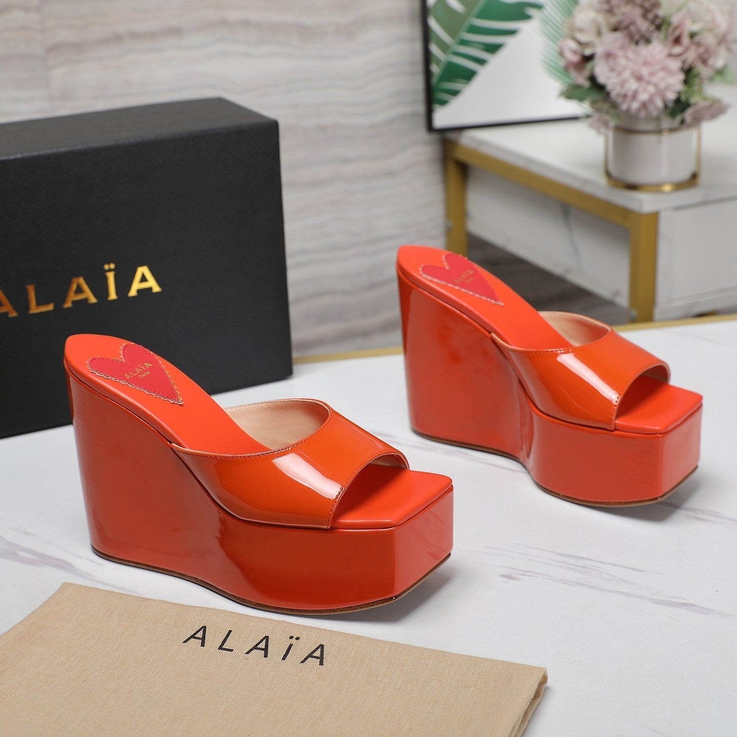 ALAIA PLATFORM WEDGE IN VIVID ORANGE LAMBSKIN WITH RED HEART