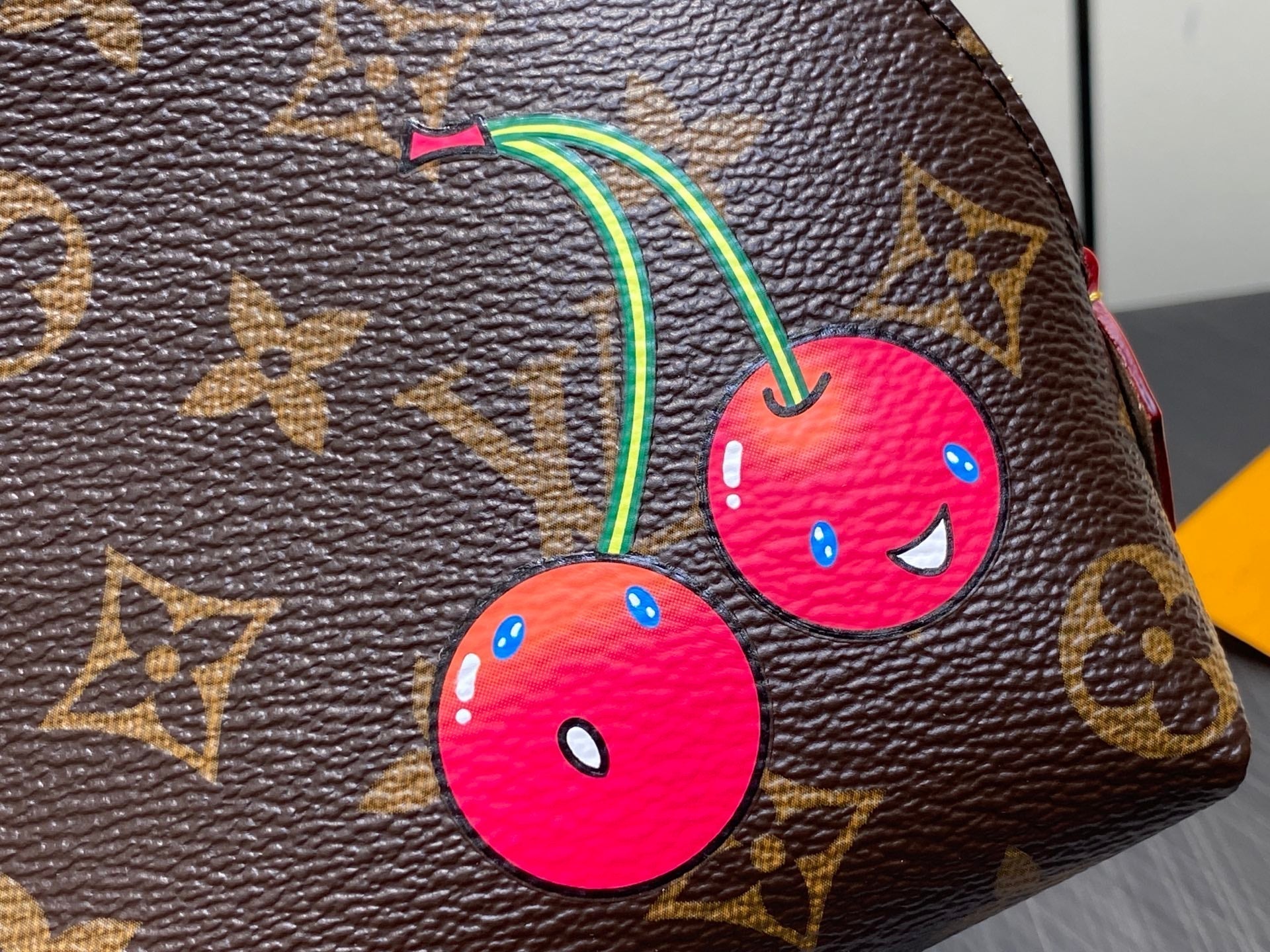LV x TM Cosmetic Pouch PM Monogram Coasted Canvas