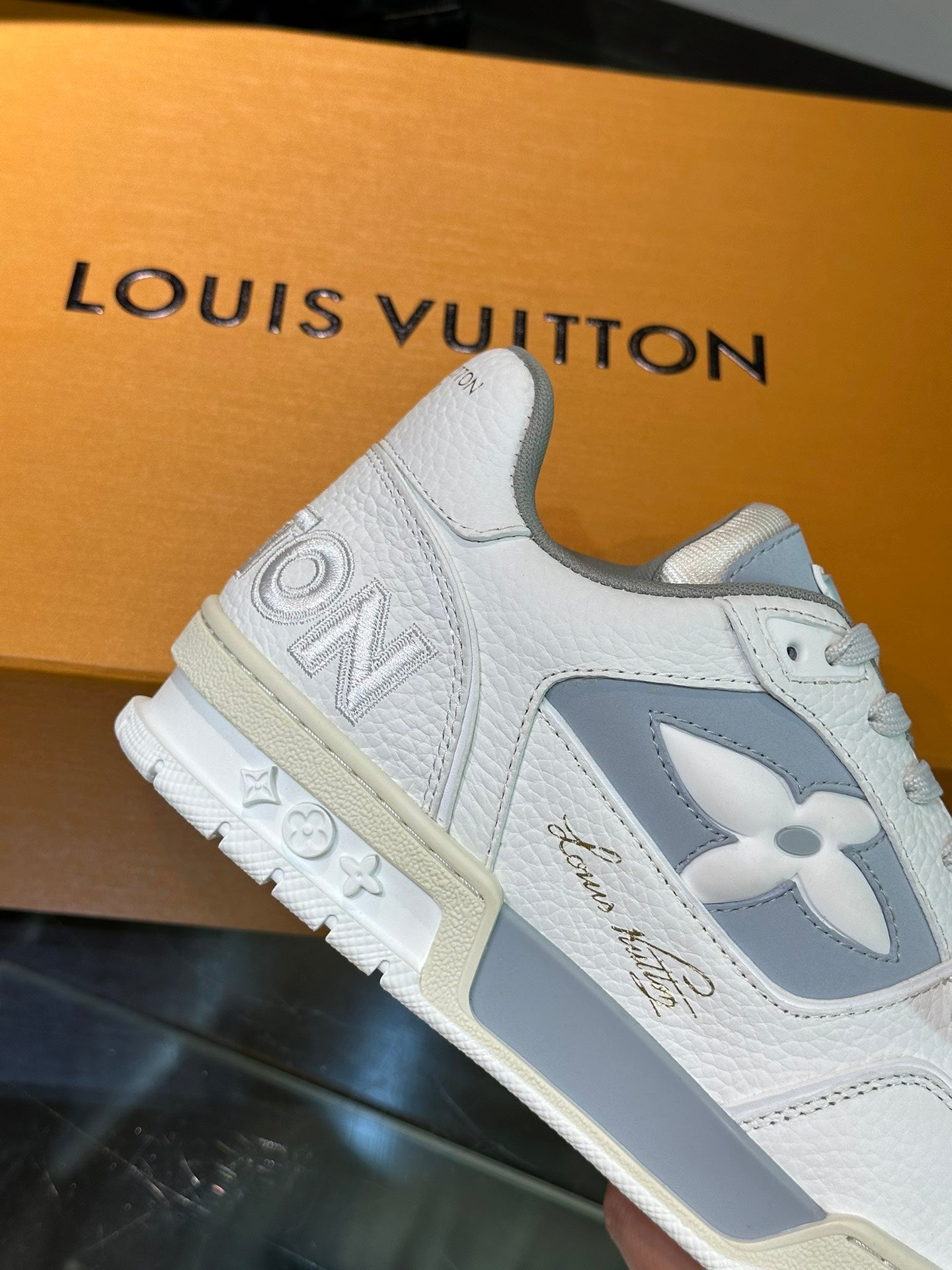 LV TRAINER SNEAKERS IN WHITE CALFSKIN AND LIGHT BLUE SUEDE