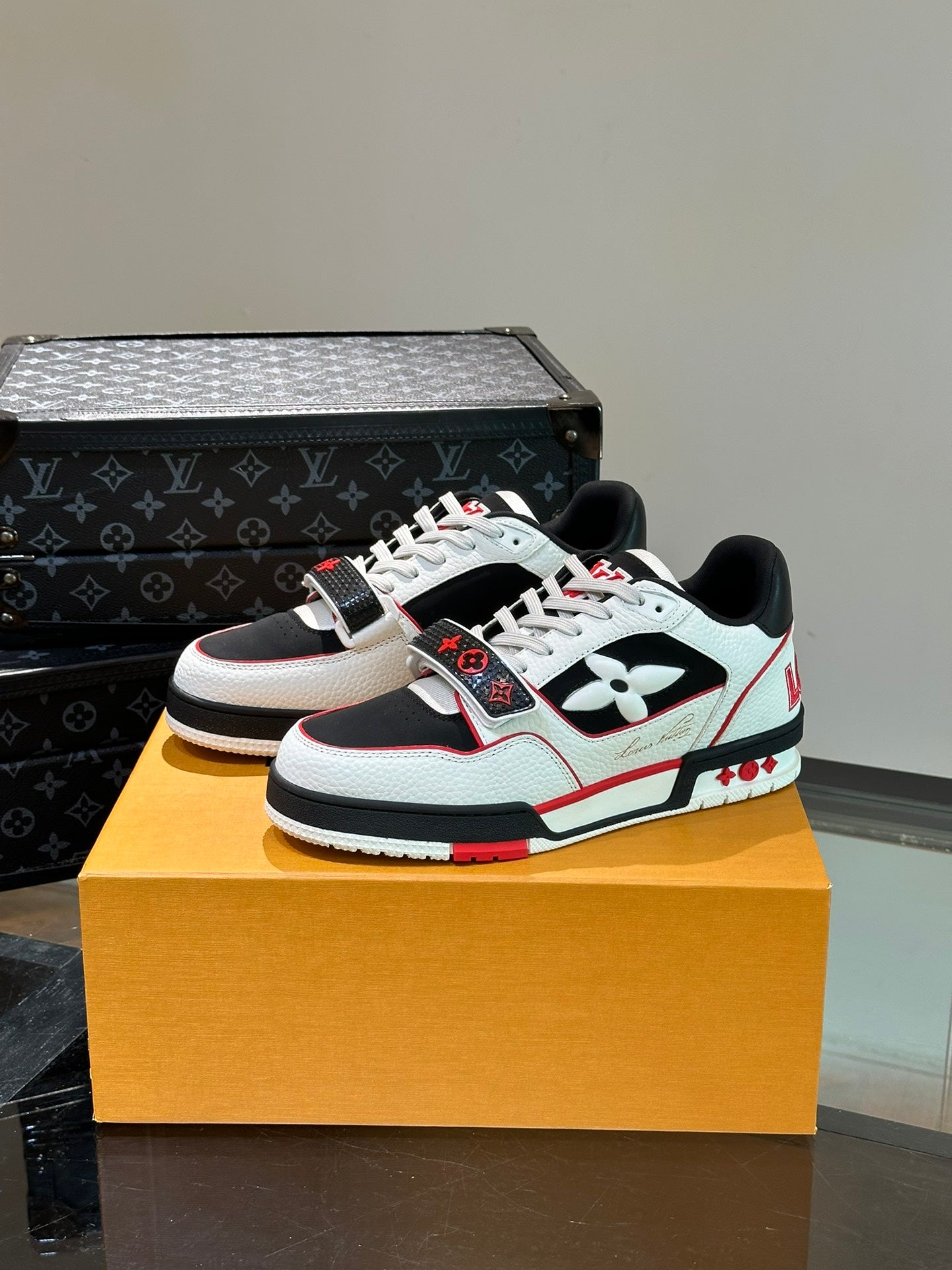 LV TRAINER SNEAKERS IN WHITE CALFSKIN AND BLACK MIX RED SUEDE