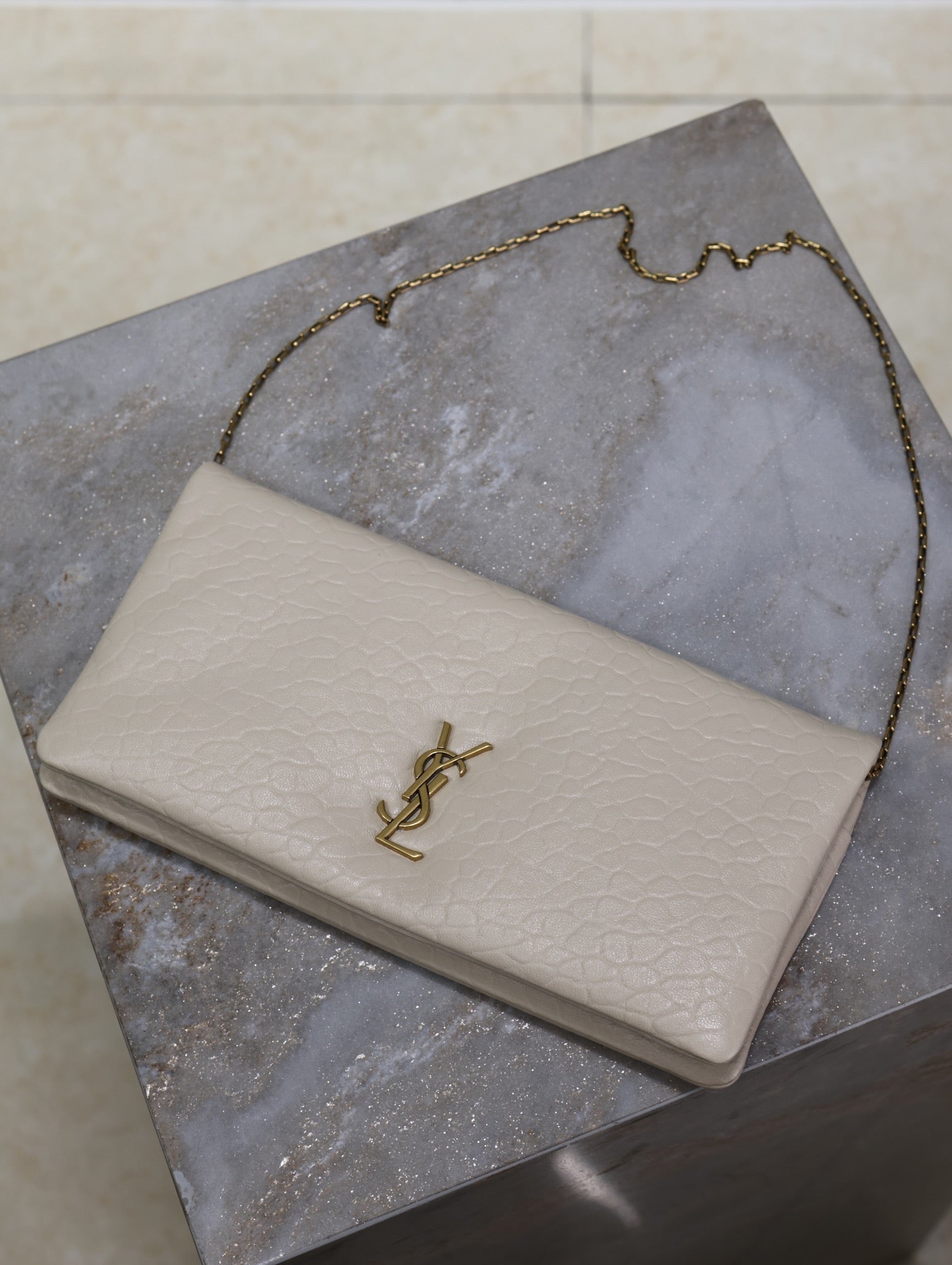 CALYPSO POUCH 24 IN CREAM ELEPHANT TEXTURED LAMBSKIN GOLD LOGO