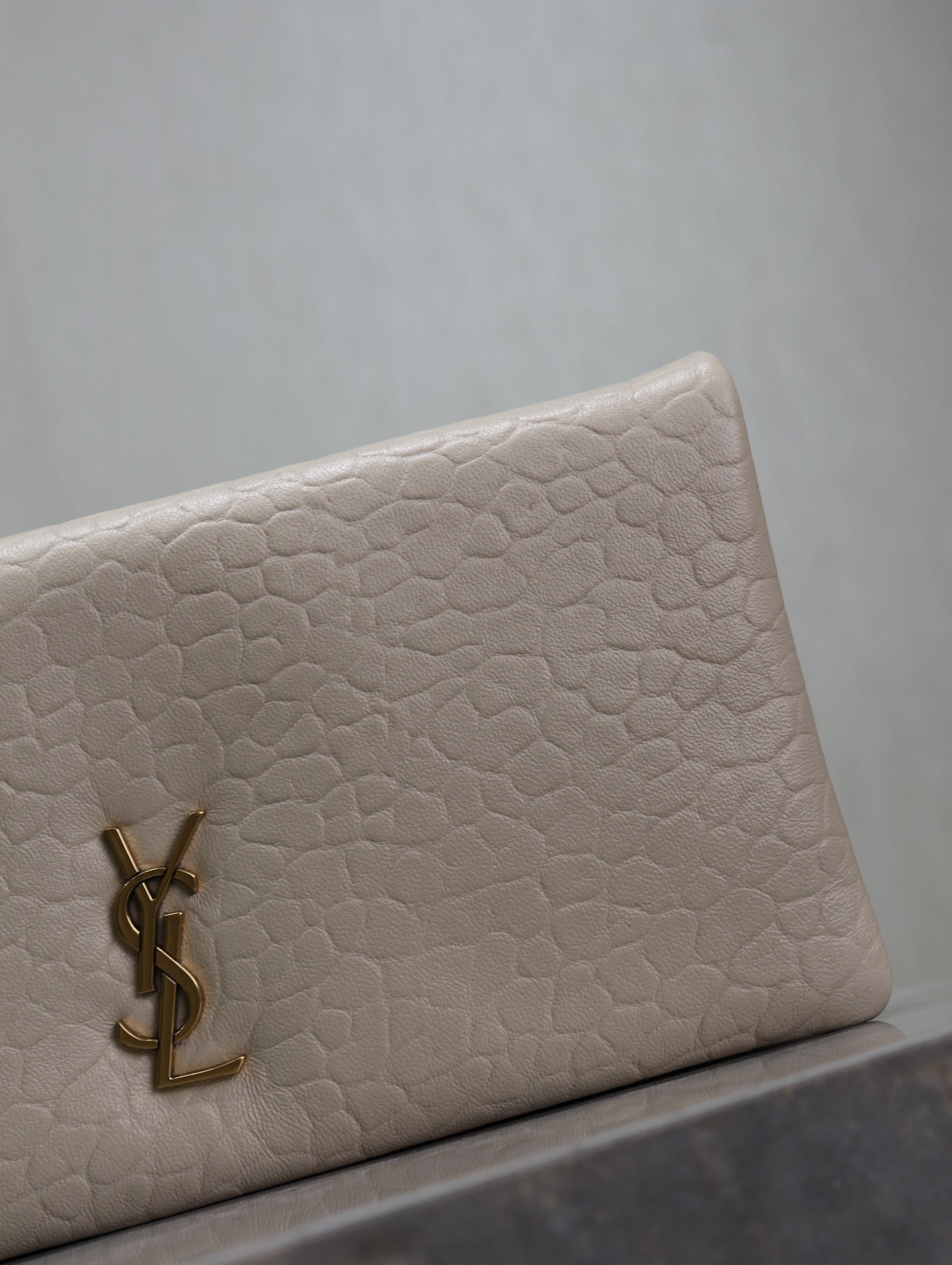 CALYPSO POUCH 24 IN CREAM ELEPHANT TEXTURED LAMBSKIN GOLD LOGO
