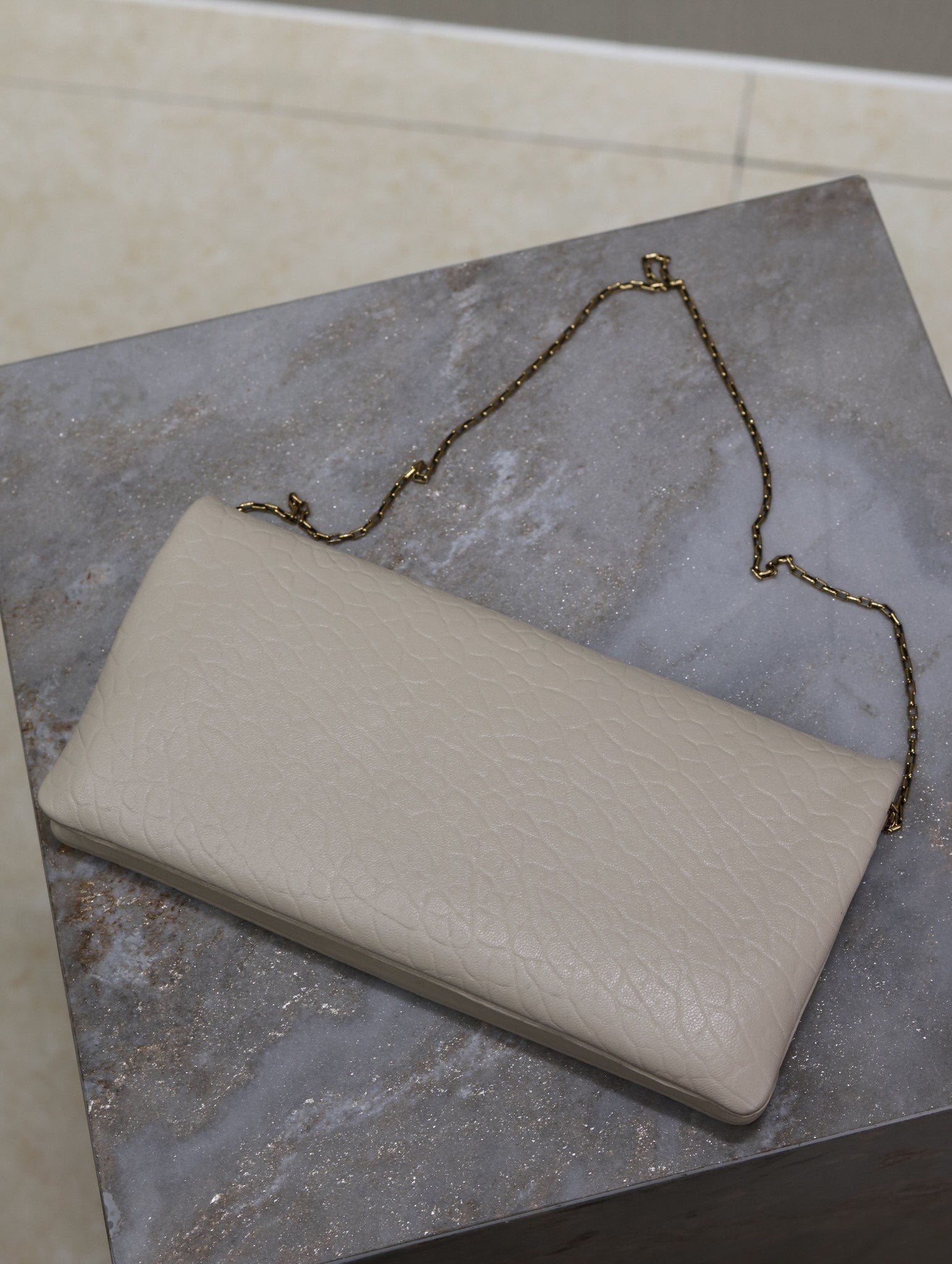 CALYPSO POUCH 24 IN CREAM ELEPHANT TEXTURED LAMBSKIN GOLD LOGO