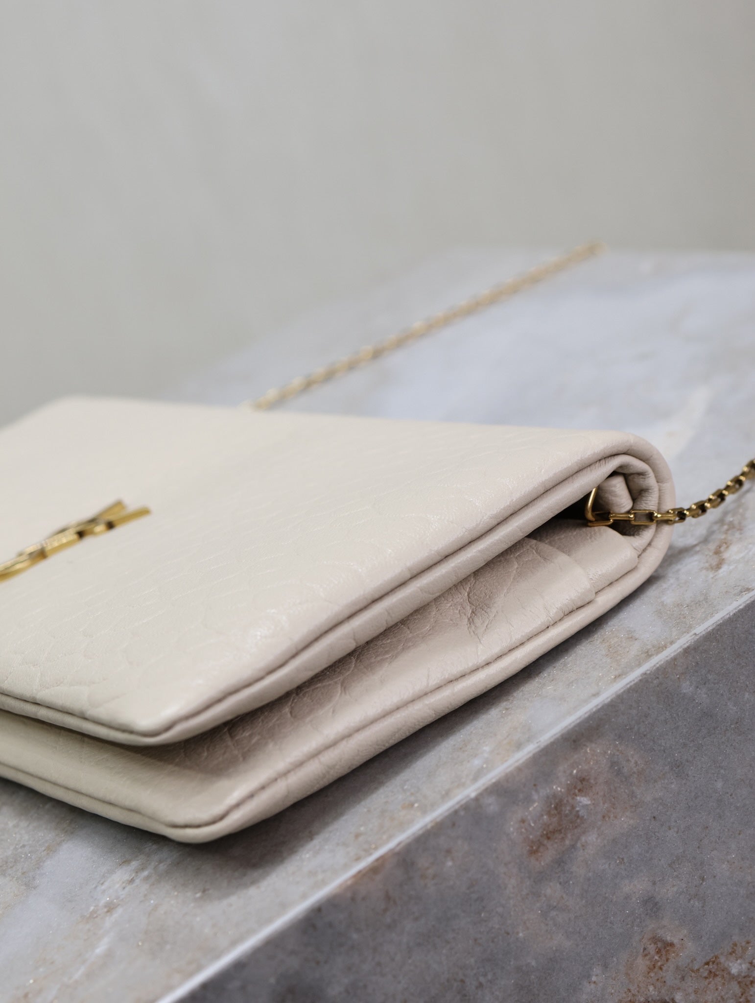CALYPSO POUCH 24 IN CREAM ELEPHANT TEXTURED LAMBSKIN GOLD LOGO