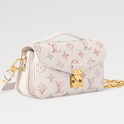 Pochette Metis East West 21.5 Cream Monogram Empreinte Calfskin